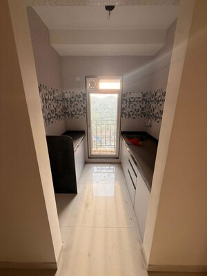 Building Lobby in 1 BHK Apartment at Raunak Bliss B1, Ghodbunder Road – for Rent