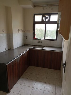 Kitchen in 2 BHK Apartment at Hiranandani Estate Capri, Ghodbunder Road – for Rent