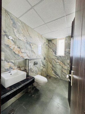 Bathroom in 3 BHK Apartment at Motia Blue Ridge, Dhakoli – for Rent