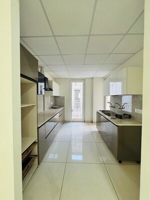 Kitchen in 3 BHK Apartment at Motia Blue Ridge, Dhakoli – for Rent