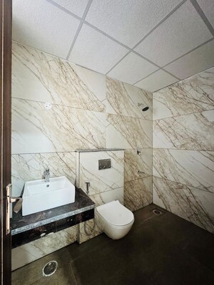 Bathroom in 3 BHK Apartment at Motia Blue Ridge, Dhakoli – for Rent