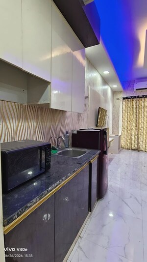 Kitchen in Studio Apartment at Gaur City Center, Sector 4 Greater Noida – for Rent