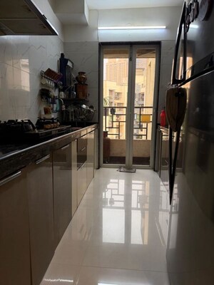Kitchen in 2 BHK Apartment at Midtown Adam, Khadakpada – for Sale