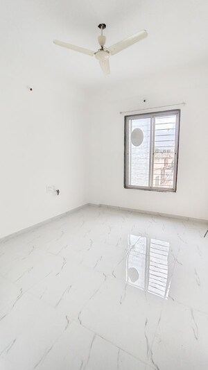 Living Room in 1 BHK Apartment at Anand Park, Wadgaon Sheri – for Rent