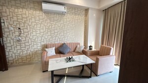 Living Room in Studio Apartment at Parx Laureate, Sector 108 – for Sale