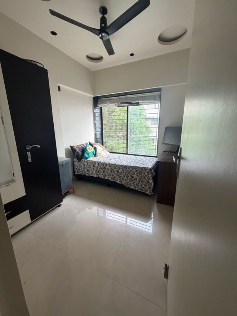 Bedroom, kalpataru-estate-building-8 2 Bedroom 1000 Sq.Ft. Apartment In Pimple Gurav Pune 10479300