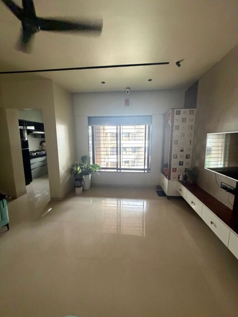 Living Room, kalpataru-estate-building-8 2 Bedroom 1000 Sq.Ft. Apartment In Pimple Gurav Pune 10479300