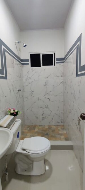 Bathroom in 4 BHK Builder Floor at Gulmohar Park – for Rent