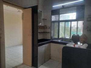 Kitchen in 1 RK Apartment at Green Arch CHS, Kandivali West – for Sale