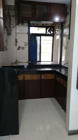 Kitchen in 1.5 BHK Apartment at Dnyan Sarathi CHS, Kharghar Sector 13 – for Rent