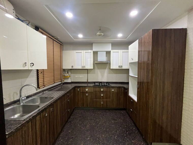 Kitchen, panchsheel park 4 Bedroom 500 Sq.Yd. Builder Floor In Panchsheel Park Delhi 10479531
