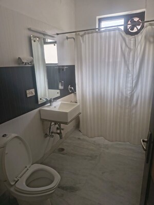 Bathroom in 5 BHK Builder Floor at Sector 15 ii – for Rent