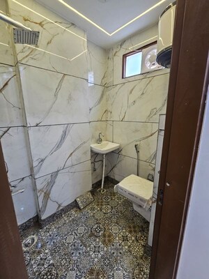 Bathroom in 2 BHK Builder Floor at Dwarka Mor – for Sale