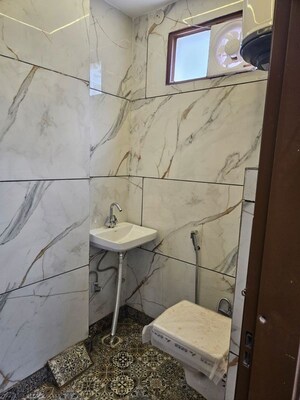 Bathroom in 2 BHK Builder Floor at Dwarka Mor – for Sale