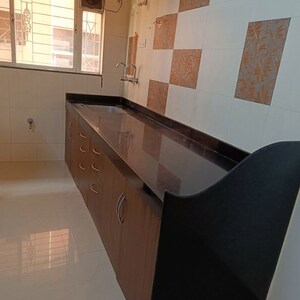 Kitchen in 2 BHK Apartment at G K Rajaveer Palace, Pimple Saudagar – for Rent