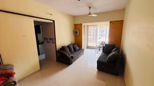 Living Room in 1 BHK Apartment at Cosmos Classique, Ghodbunder Road – for Rent