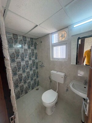 Bathroom in 2 BHK Apartment at Signature The Millennia 3, Sector 37d – for Rent