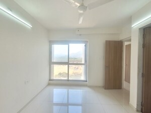 Building Lobby in 1.5 BHK Apartment at Godrej Emerald, Ghodbunder Road – for Rent