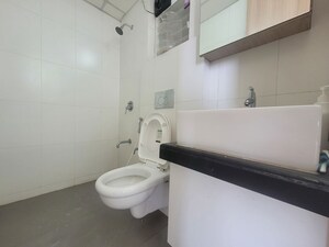 Bathroom in 1.5 BHK Apartment at Godrej Emerald, Ghodbunder Road – for Rent