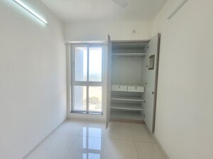 Building Lobby in 1.5 BHK Apartment at Godrej Emerald, Ghodbunder Road – for Rent