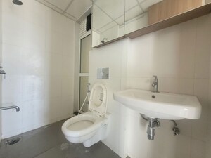 Bathroom in 1.5 BHK Apartment at Godrej Emerald, Ghodbunder Road – for Rent