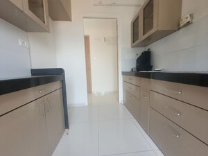 Kitchen in 1.5 BHK Apartment at Godrej Emerald, Ghodbunder Road – for Rent