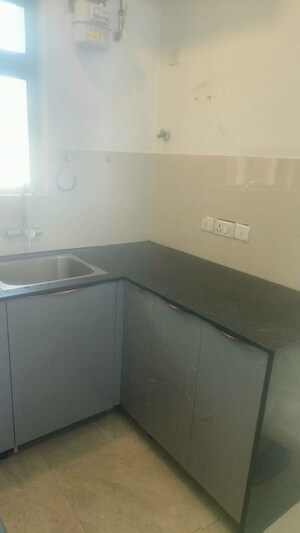 Kitchen in 1 BHK Apartment at Hiranandani The Walk, Ghodbunder Road – for Rent