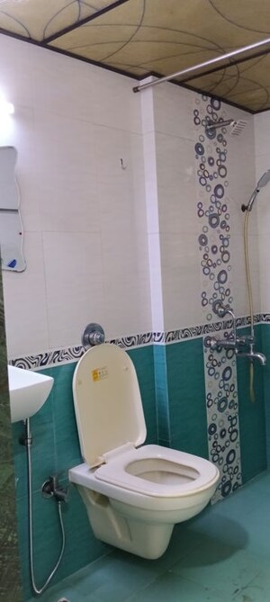 Bathroom in 2 BHK Apartment at Purvi Apartment, Andheri West – for Rent