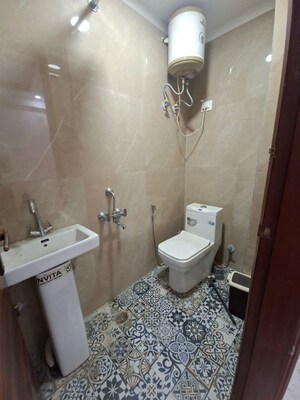 Bathroom in 2 BHK Builder Floor at Chattarpur – for Rent