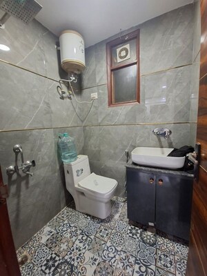 Bathroom in 2 BHK Builder Floor at Chattarpur – for Rent