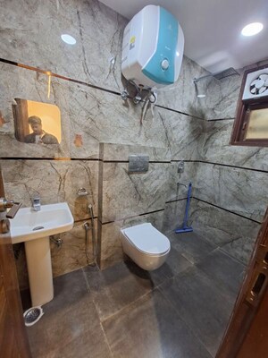 Bathroom in 2 BHK Builder Floor at Chattarpur – for Rent