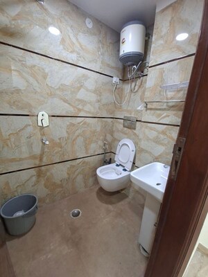 Bathroom in 2 BHK Builder Floor at Chattarpur – for Rent
