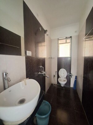 Bathroom in 3 BHK Apartment at Rustomjee Athena, Majiwada – for Rent