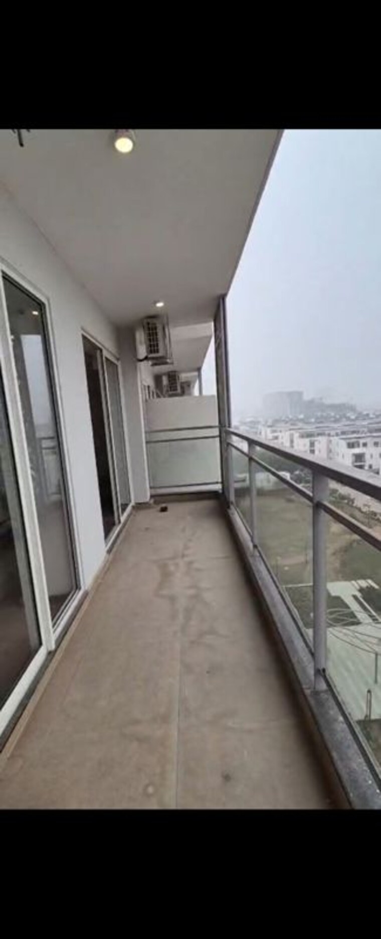 Balcony, godrej-golf-link-villas 1.5 Bedroom 975 Sq.Ft. Apartment In Sector 27 Yamuna Expressway Greater Noida 10480167