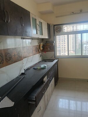 Kitchen in 3 BHK Apartment at Prathana Acharya Ashram, Borivali West – for Sale
