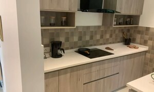 Kitchen in 3.5 BHK Apartment at Godrej Palm Retreat, Sector 150 – for Sale
