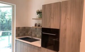 Kitchen in 3.5 BHK Apartment at Godrej Palm Retreat, Sector 150 – for Sale