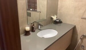 Bathroom in 3.5 BHK Apartment at Godrej Palm Retreat, Sector 150 – for Sale