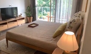 Bedroom in 3.5 BHK Apartment at Godrej Palm Retreat, Sector 150 – for Sale