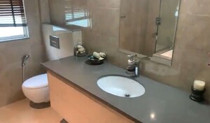 Bathroom in 3.5 BHK Apartment at Godrej Palm Retreat, Sector 150 – for Sale