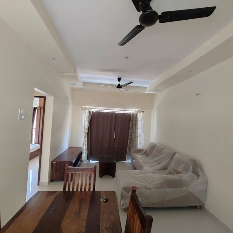 Living Room, kumar-megapolis-saffron 2 Bedroom 845 Sq.Ft. Apartment In Hinjewadi Pune 10480423