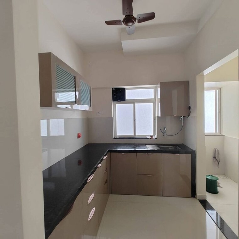 Kitchen, kumar-megapolis-saffron 2 Bedroom 845 Sq.Ft. Apartment In Hinjewadi Pune 10480423