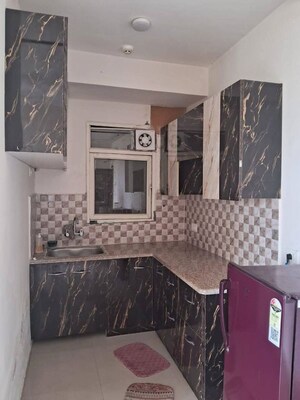 Kitchen in 2 BHK Builder Floor at Lucky The Palm Valley, Sector 1 Greater Noida – for Rent