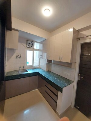 Kitchen in 1 BHK Apartment at Shree Vardhman Green Court, Sector 90 – for Rent
