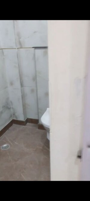 Bathroom in 3 BHK Builder Floor at Rohini Sector 8 – for Sale