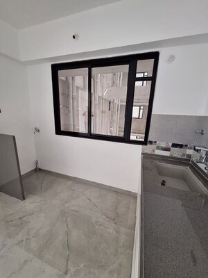 Kitchen in 1 BHK Apartment at Unique Youtopia, Kharadi – for Rent