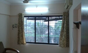 Room in 2 BHK Apartment at Serenity Complex, Andheri West – for Rent