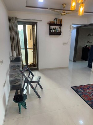 Living Room in 2 BHK Apartment at Neminath Imperia, Andheri West – for Rent