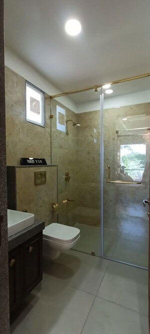 Bathroom in 3 BHK Apartment at Courtyard Palladium, Bhayli – for Sale