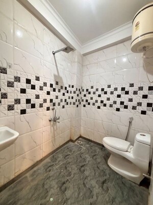 Bathroom in 1 BHK Builder Floor at Freedom Fighters Enclave – for Rent